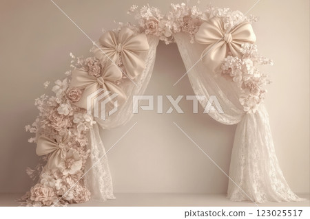 Elegant wedding arch with floral decor creating a romantic celebration atmosphere Elegant wedding arch with floral decor creating a romantic celebration atmosphere 123025517