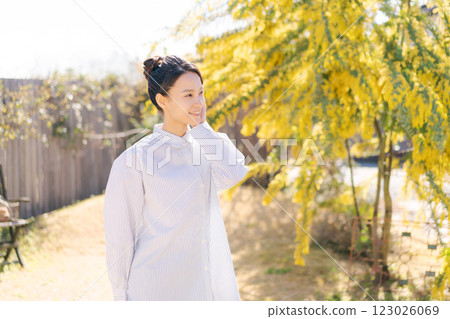 Woman in a natural garden 123026069