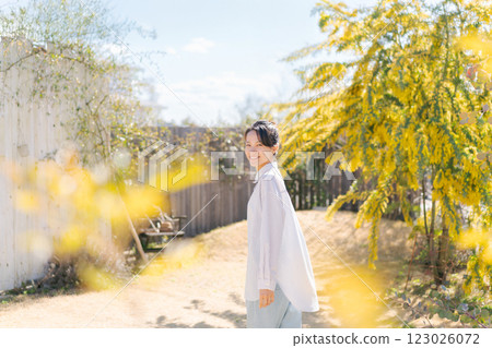 Woman in a natural garden 123026072