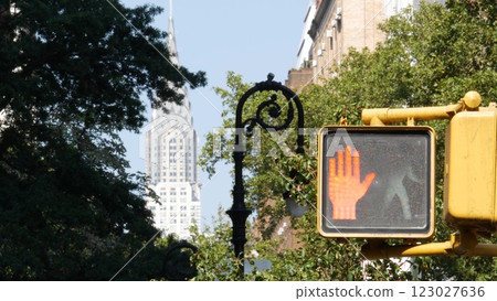 New York City street crossroad, yellow traffic light, transport road intersection, United States. 123027636