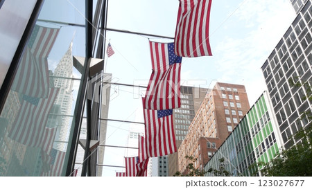 New York, american flag waving. Chrysler building. Manhattan midtown city street banner, patriotism. New York, american flag waving. Chrysler building. Manhattan midtown city street banner, patriotism. 123027677