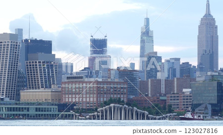 New York City waterfront skyline, Manhattan Midtown cityscape, Empire State Building, Little Island. 123027816