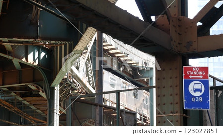 New York City elevated subway, metropolitan bridge, metro train track above street. Railway transport New York City elevated subway, metropolitan bridge, metro train track above street. Railway transport 123027851