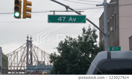 New York City street crossroad, yellow traffic light, transport road intersection, United States. 123027924