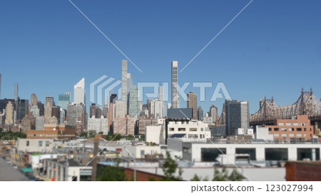 New York City Manhattan skyline cityscape. Queensboro Bridge from Queens to Midtown. Rooftop or roof New York City Manhattan skyline cityscape. Queensboro Bridge from Queens to Midtown. Rooftop or roof 123027994