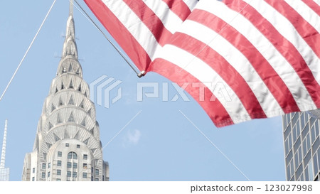 New York, american flag waving. Chrysler building. Manhattan midtown city street banner, patriotism. 123027998