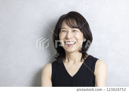 Smiling cute middle-aged woman 123028752