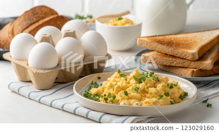 Delicious Homemade Breakfast Spread with Scrambled Eggs Bread and Dairy Delicious Homemade Breakfast Spread with Scrambled Eggs Bread and Dairy 123029160