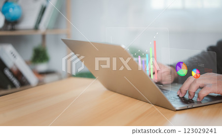 Data and management analysis system with KPIs and indicators connected to databases for finance, Technology, Operations, marketing, Laptop computer on white background and dashboard for business chart 123029241