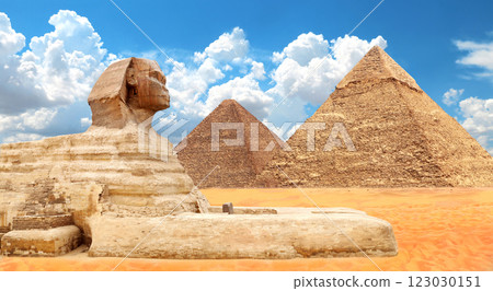 Famous Great Sphinx and pyramids of Chephren, Cheops, Menkaure, Cairo, Egypt. Great Pyramids and statue of Sphinx, mythical creature with head of man and body of lion, Giza complex (Giza Necropolis) Famous Great Sphinx and pyramids of Chephren, Cheops, Menkaure, Cairo, Egypt. Great Pyramids and statue of Sphinx, mythical creature with head of man and body of lion, Giza complex (Giza Necropolis) 123030151