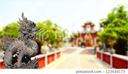 Horizontal banner with ancient vietnamese dragon statue, Hoi An, Vietnam. Bronze guardian dragon near to temple, Asia. Topic of vacation, travel, trip abroad on vacation, cruises and tours Horizontal banner with ancient vietnamese dragon statue, Hoi An, Vietnam. Bronze guardian dragon near to temple, Asia. Topic of vacation, travel, trip abroad on vacation, cruises and tours 123030173