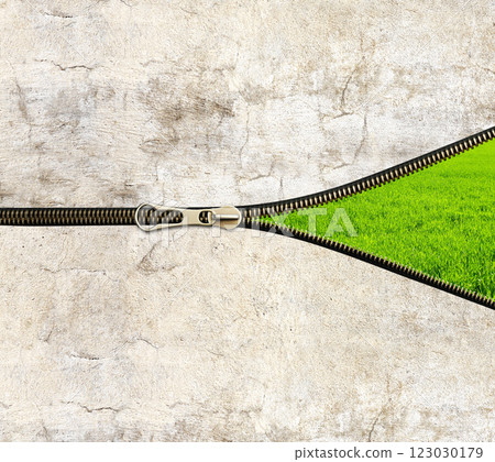 New city life concept. Concrete wall, zipper opened and green grass. Unzipped zipper or fastener. Eco-friendly, Ecology, go green, Green Energy, environmental, zero waste, responsible consumption New city life concept. Concrete wall, zipper opened and green grass. Unzipped zipper or fastener. Eco-friendly, Ecology, go green, Green Energy, environmental, zero waste, responsible consumption 123030179