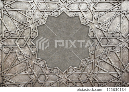 Frame with traditional islamic ornament. Copper window shutter with antique and national moroccan floral pattern. Oriental ornaments with artistic with chasing for brass. Copy space for text Frame with traditional islamic ornament. Copper window shutter with antique and national moroccan floral pattern. Oriental ornaments with artistic with chasing for brass. Copy space for text 123030184