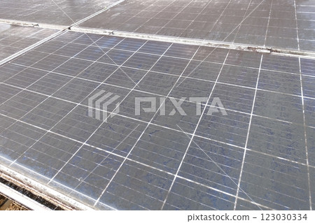 Close-up of a dirty solar panel Dirty solar panel Close-up of a dirty solar panel Dirty solar panel 123030334