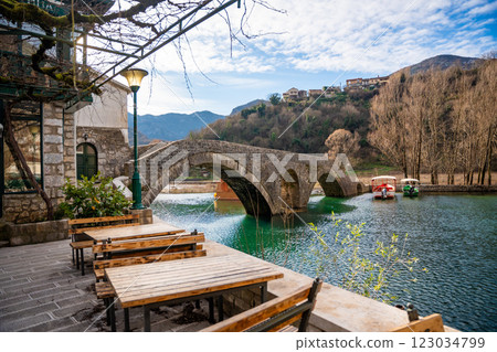 Arched bridge over Crnojevic river in small town near Skadar lake in Montenegro in winter time 123034799