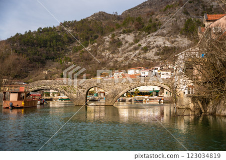 Arched bridge over Crnojevic river in small town near Skadar lake in Montenegro in winter time Arched bridge over Crnojevic river in small town near Skadar lake in Montenegro in winter time 123034819
