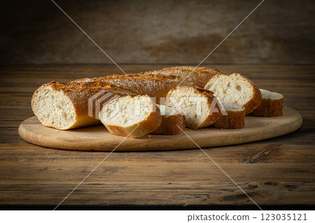 sliced bread on wooden table 123035121
