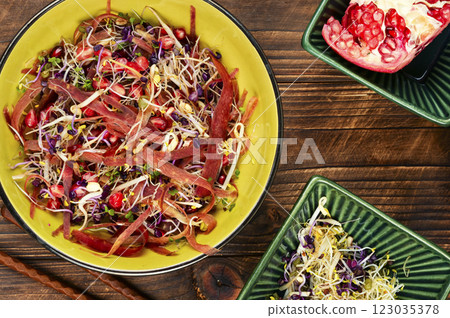 Healthy salad with sprouts and lettuce. Healthy salad with sprouts and lettuce. 123035378