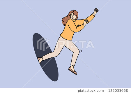 Happy woman jumps out of hole, showing readiness to move forward and energetic mood 123035668