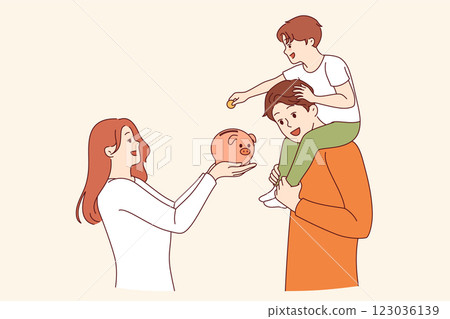 Teaching child financial literacy in young family, using pig piggy bank to save money 123036139