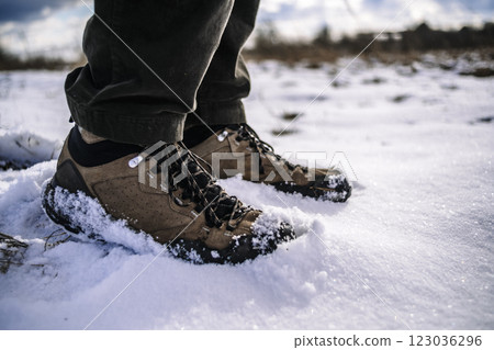 Hiker goes against sky and sun. Hiking concept  123036296