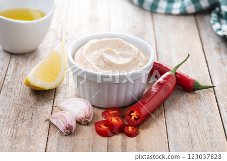 Mexican sauce and spices on wooden table Mexican sauce and spices on wooden table 123037828