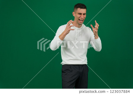 Frustrated 30s employee in formal wear holding paper dismissal notice, unhappy confused young businessman feeling stressed about bad news in letter, company bankruptcy or financial problems. 123037884