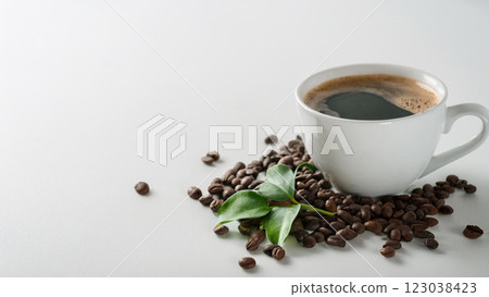 Hot coffee and coffee beans Hot coffee and coffee beans 123038423