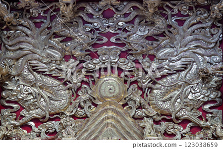 Elaborate sculptures on ceiling design inside the Buddhist temple of Wat Dhammakatanyu. 123038659