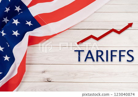 Trade Tariffs concepts with United States of America Flag on the table. Trade Tariffs concepts with United States of America Flag on the table. 123040874