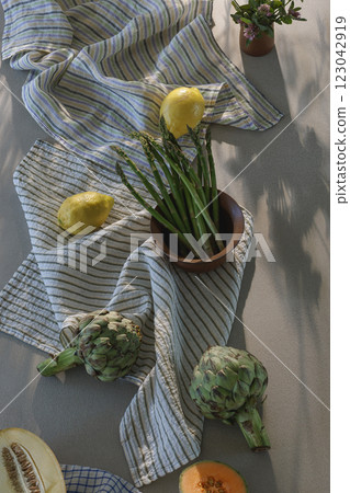 Fresh healthy vegetables and fruits on kitchen counter top view. Healthy lifestyle concept. Kitchen aesthetics concept 123042919