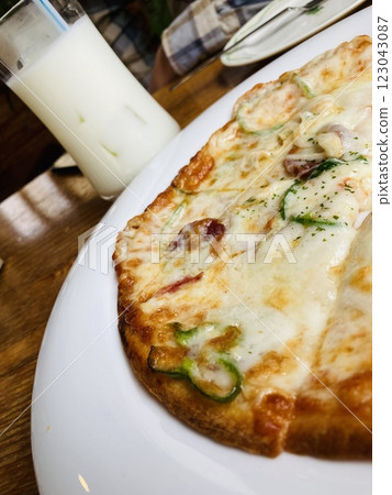 Delicious pizza and milk 123043087