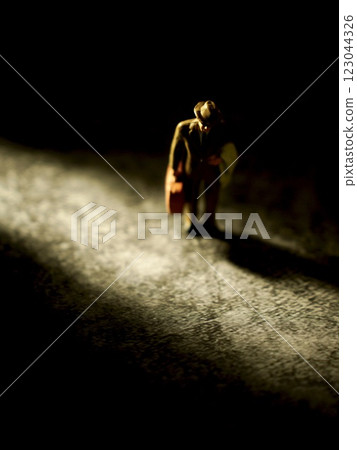 Miniature businessman Miniature businessman 123044326