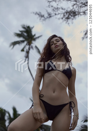 Beautiful young woman on the beach. sensual pretty Sexy girl in Bikini 123044695