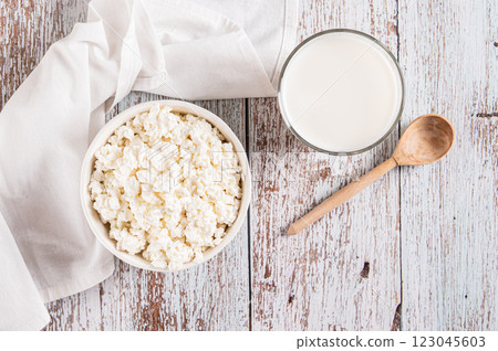 A bowl of fresh cottage cheese for breakfast on the table top view 123045603