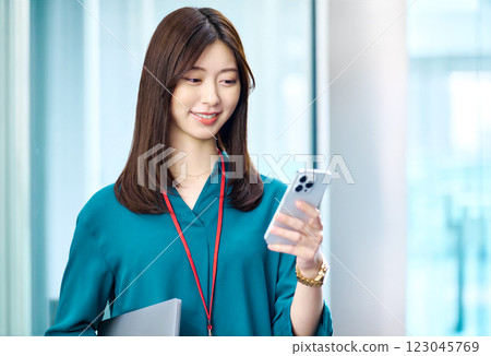 Businesswoman holding Suho Photo courtesy of Sky Perfect Tokyo Media Center 123045769