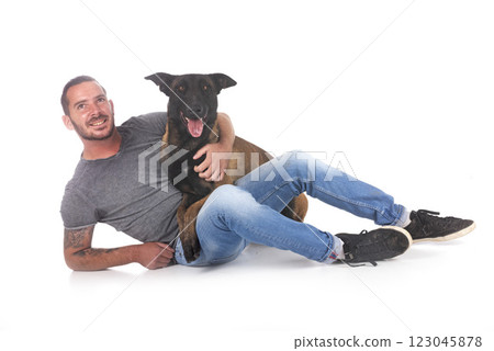 malinois and owner in studio 123045878