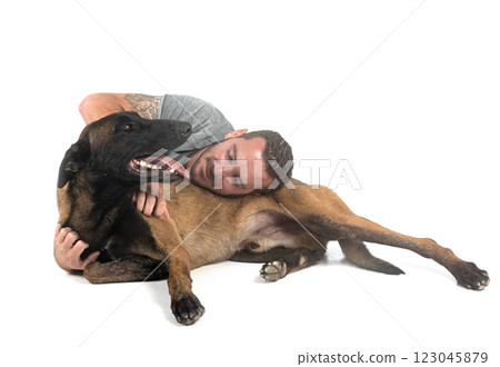 malinois and owner in studio 123045879