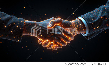A handshake that symbolizes cooperation and the addition of glowing effects. 123046211