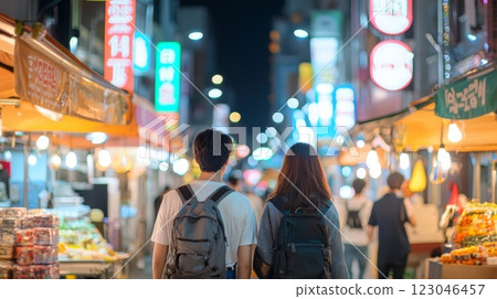 Couple Walking Through Vibrant Night Market in Seoul, South Korea 123046457