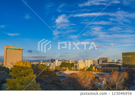 The cityscape of Hamamatsu City on an autumn evening as seen from around Hamamatsu Castle (Shizuoka Prefecture) 123046956