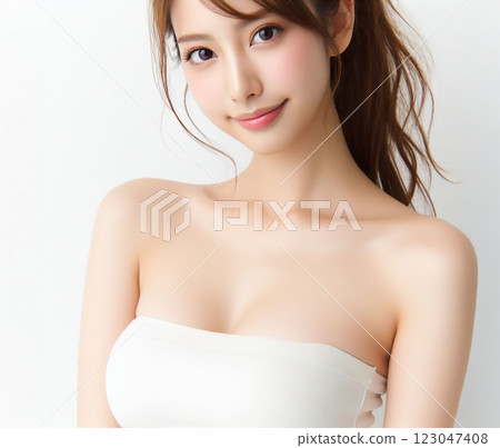 Beautiful woman in white tube top Beautiful woman in white tube top 123047408