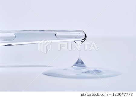 Pipette with delicate blue serum close-up. Pipette with delicate blue serum close-up. 123047777