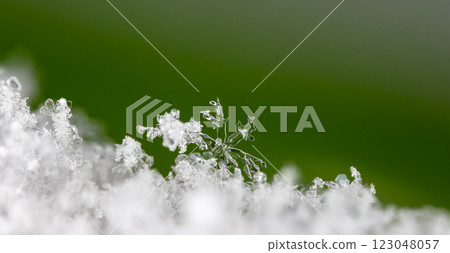 natural snowflakes on snow, winter natural snowflakes on snow, winter 123048057