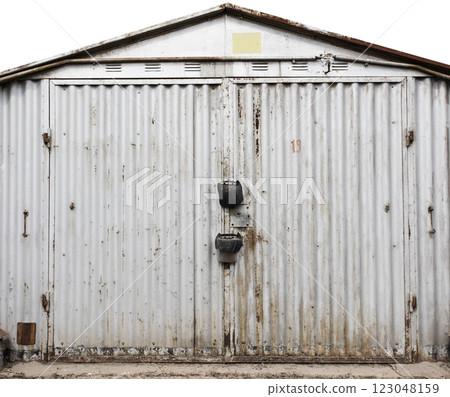 old metal warehouse door, hangar 123048159