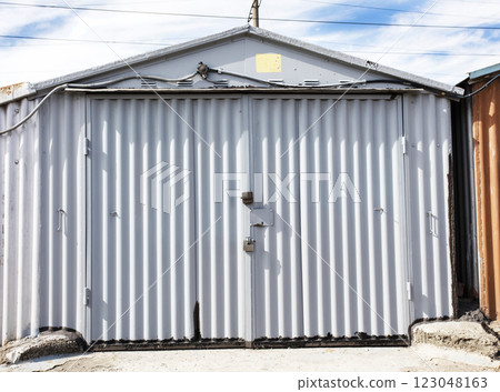 old metal warehouse door, hangar old metal warehouse door, hangar 123048163