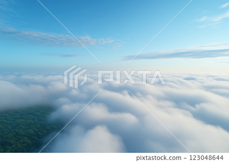 Beautiful aerial view above clouds with blue sky. 123048644