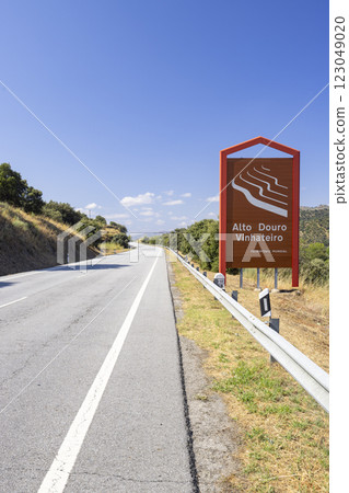 Road to Pocinho with text Alto Douro, UNESCO site, Alto Douro wine region, Portugal 123049020