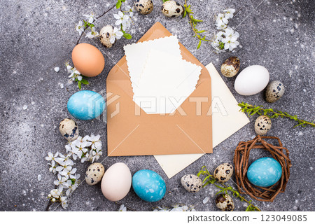 Easter eggs and open envelope Easter eggs and open envelope 123049085