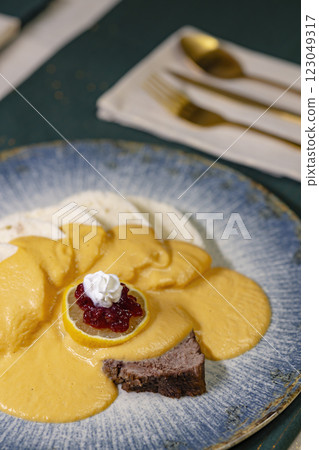 Traditional Christmas dinner in Czech Republic - sirloin in cream sauce Traditional Christmas dinner in Czech Republic - sirloin in cream sauce 123049317